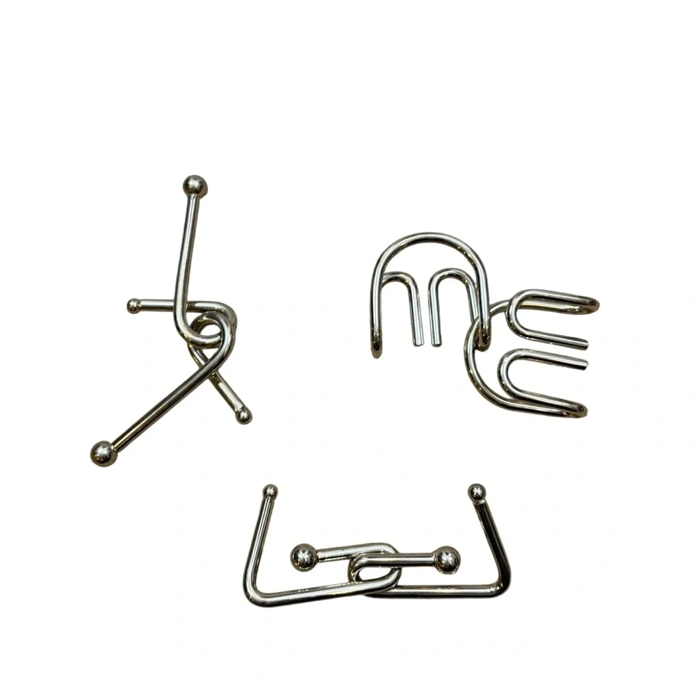 Lot‎ of Three Metal Brain Teaser Puzzles